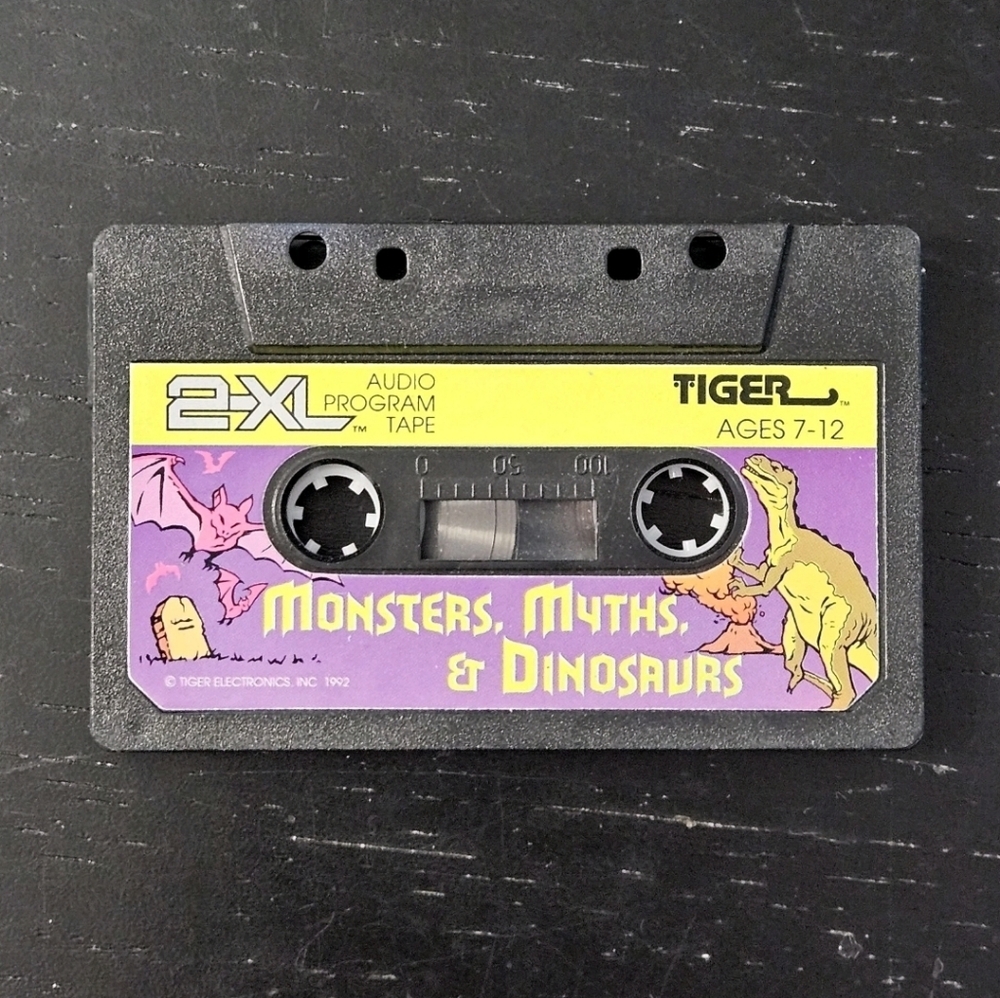 Tiger 2-XL Robot Monsters Myths & Dinosaurs Cassette Tape 1992